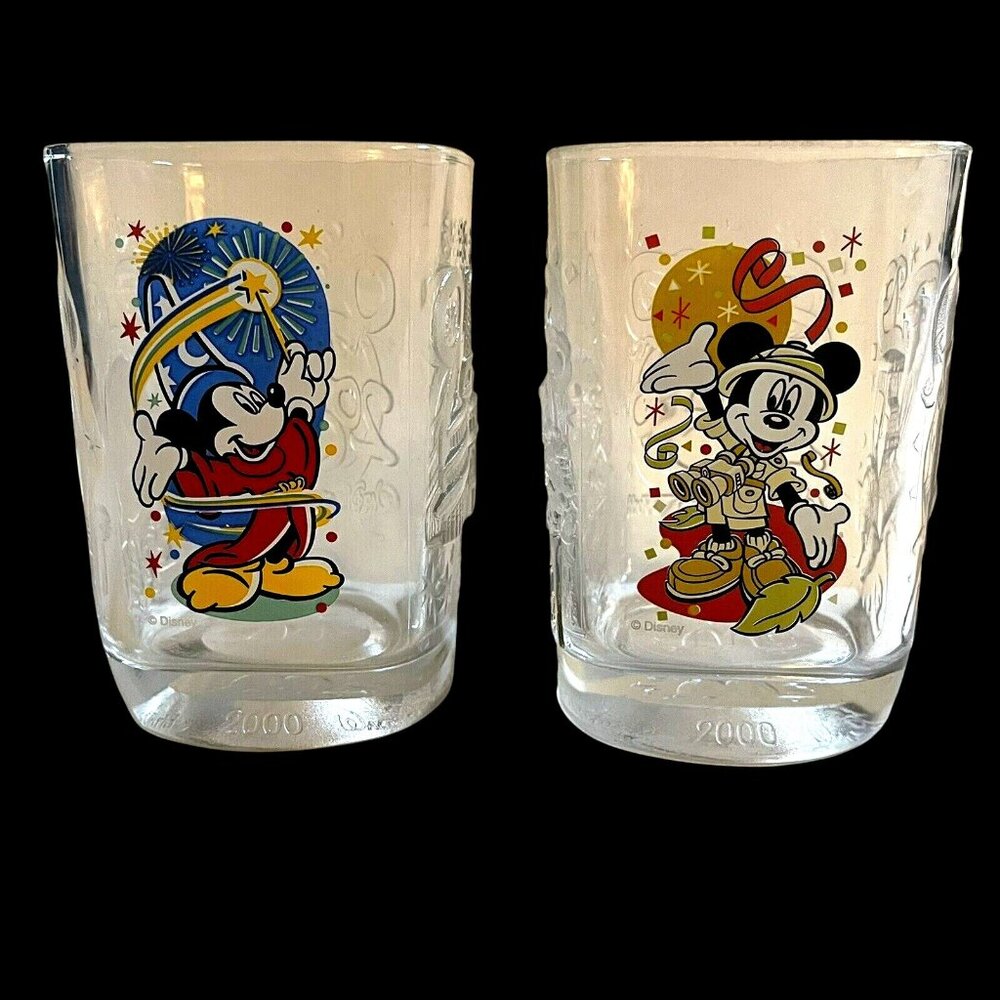 Set of 2 VTG McDonald’s issue 2000 Disney World Celebration collector’s glasses